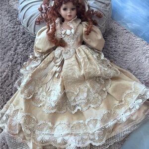 Charming Porcelain Doll with Cream and White Lace Dress